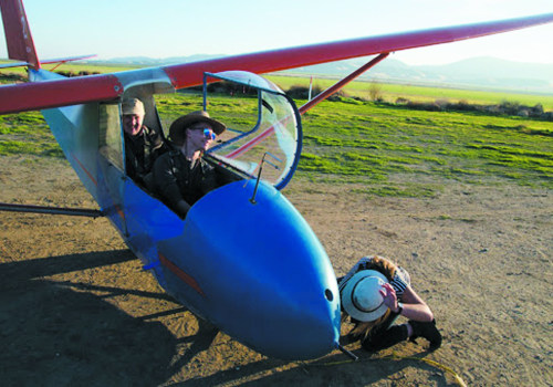 Can you fly a glider with a private pilot license?